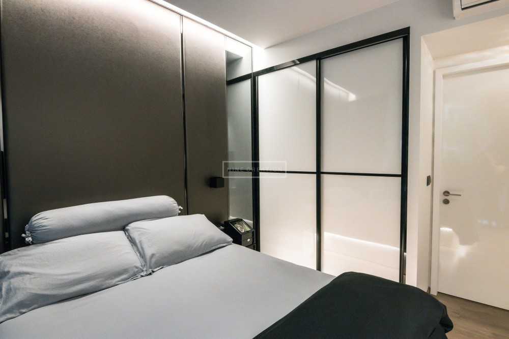 Contemporary Bedroom with Cove Lighting and Wardrobe