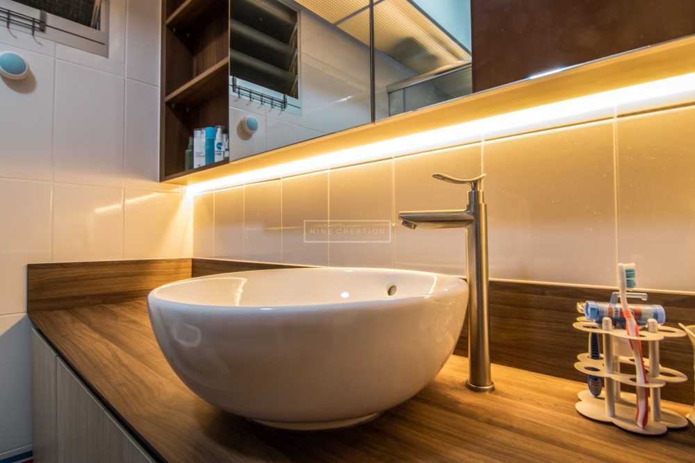 Scandinavian Bathroom with Countertop and Cove Lighting
