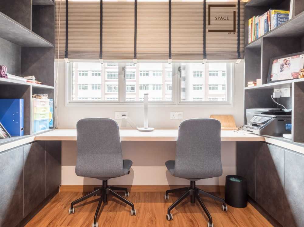 Minimalist Home Office with Bookshelf and Desk