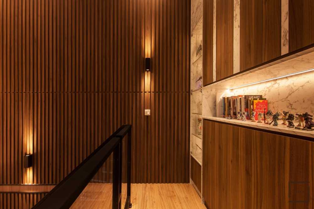 Modern Living Room with Bookshelf and Feature Wall