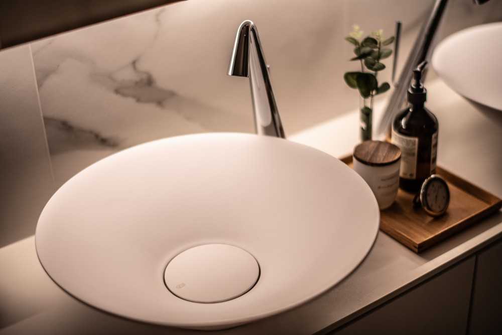 Scandinavian Bathroom with Countertop and Mirror