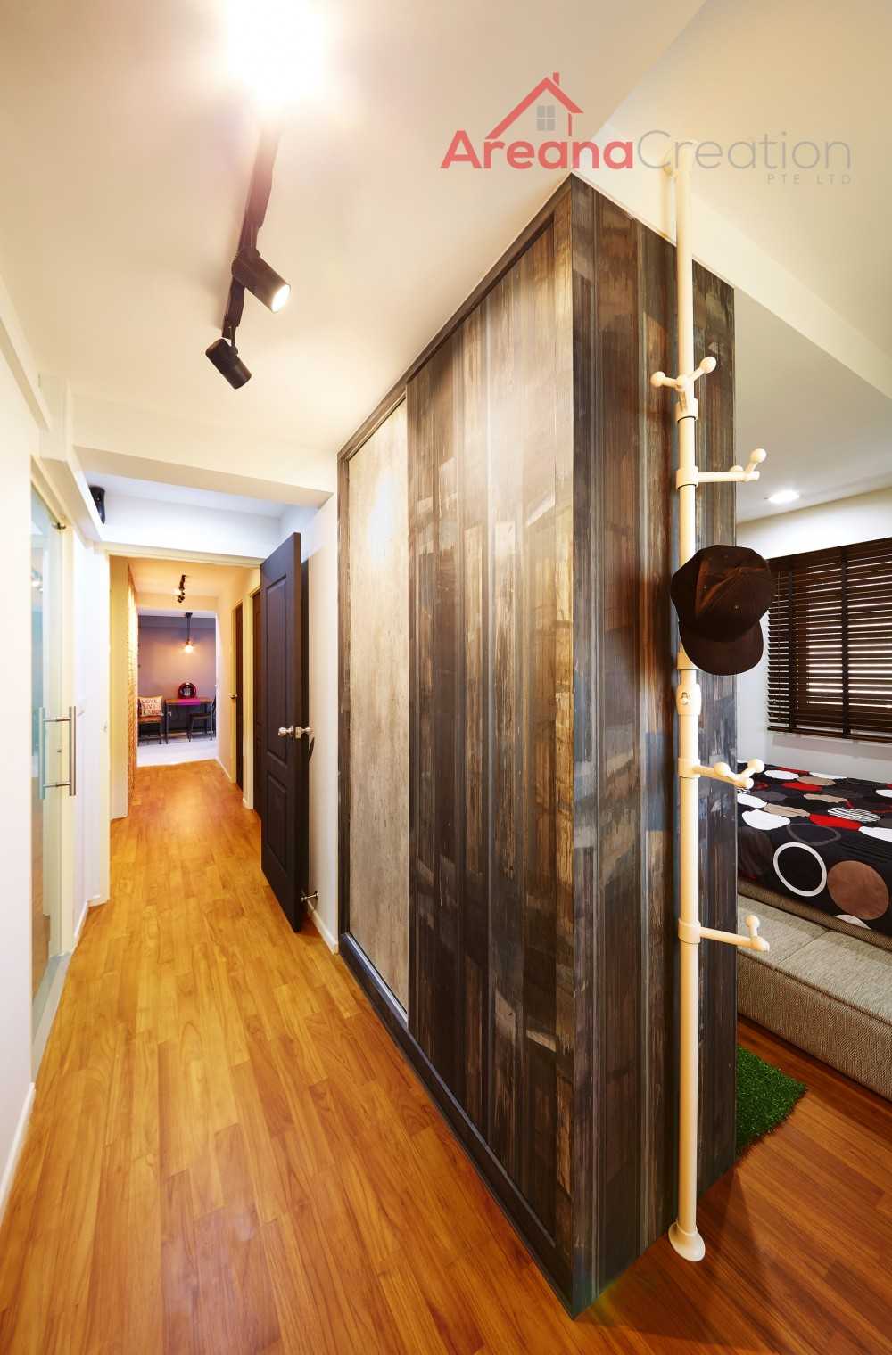 Industrial Bedroom with Wood Flooring and Drop Light