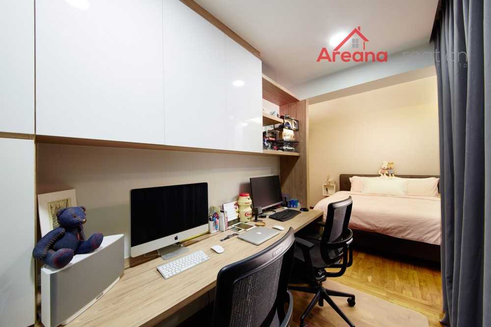 Contemporary Home Office with Bookshelf and Desk