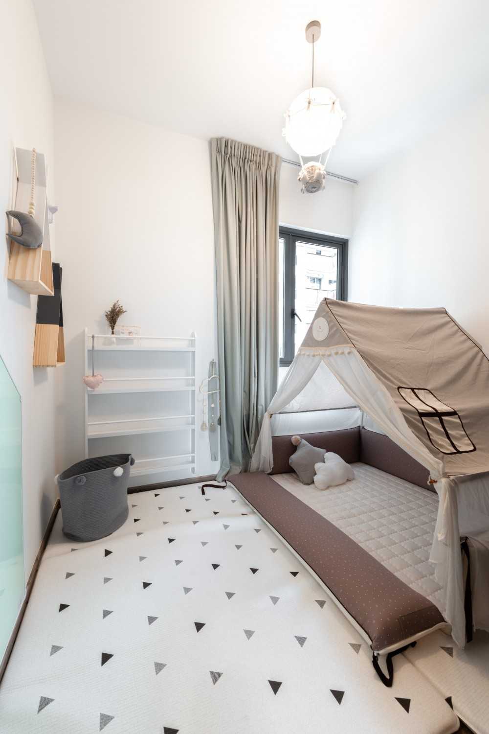 Scandinavian Kids Room with Bookshelf and Toys