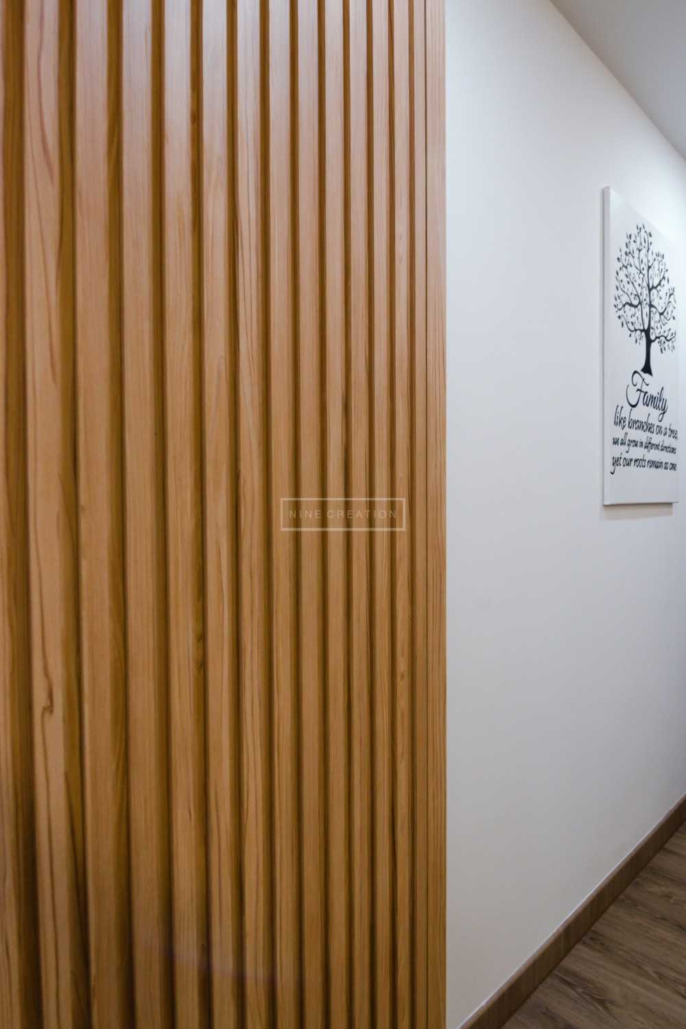 Scandinavian Entryway with Feature Wall and Wood Feature Wall