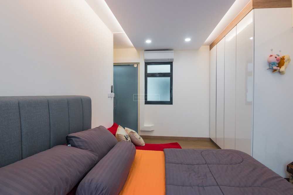 Scandinavian Bedroom with Cove Lighting and Drop Ceiling