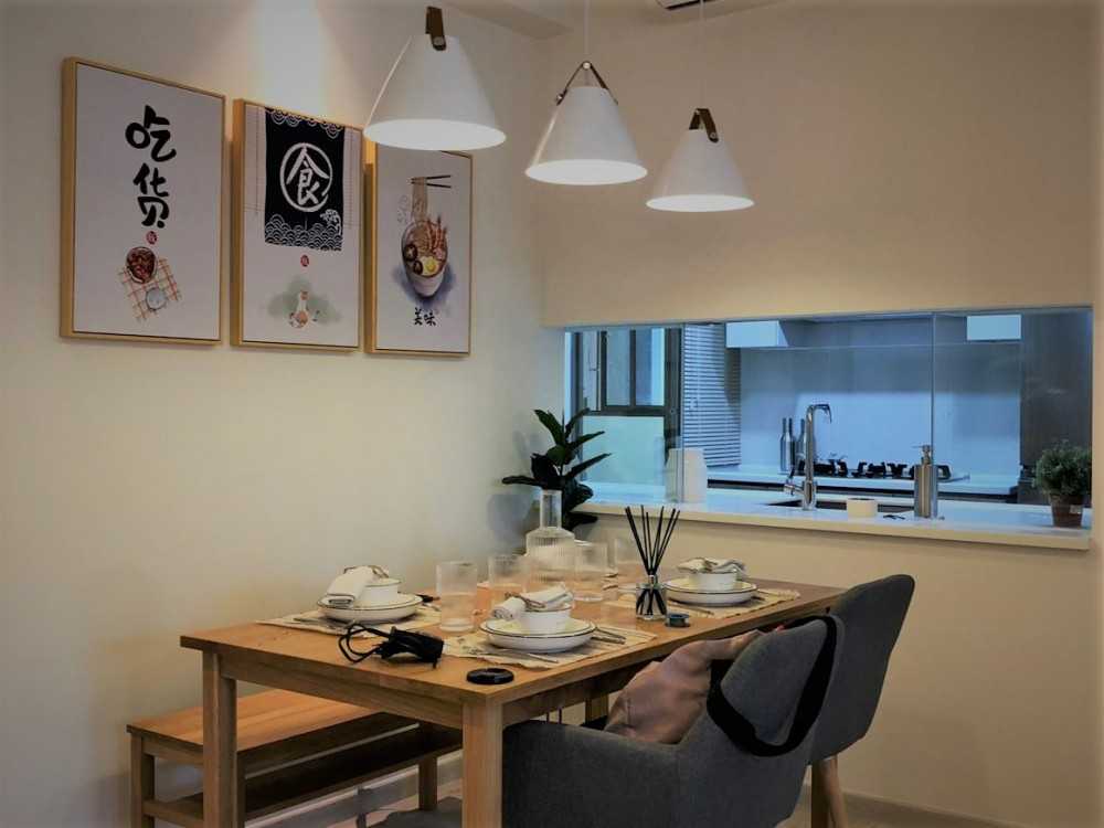 Scandinavian Dining Room with Chandelier and Dining Table
