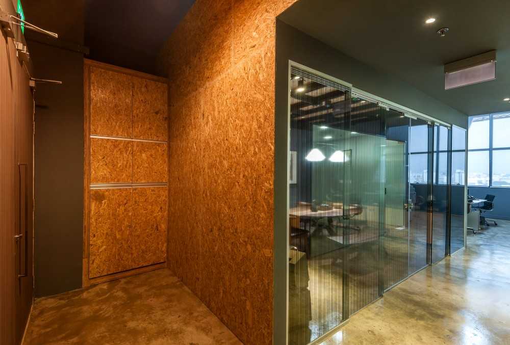 Industrial Foyer with Cement Floor and Feature Wall