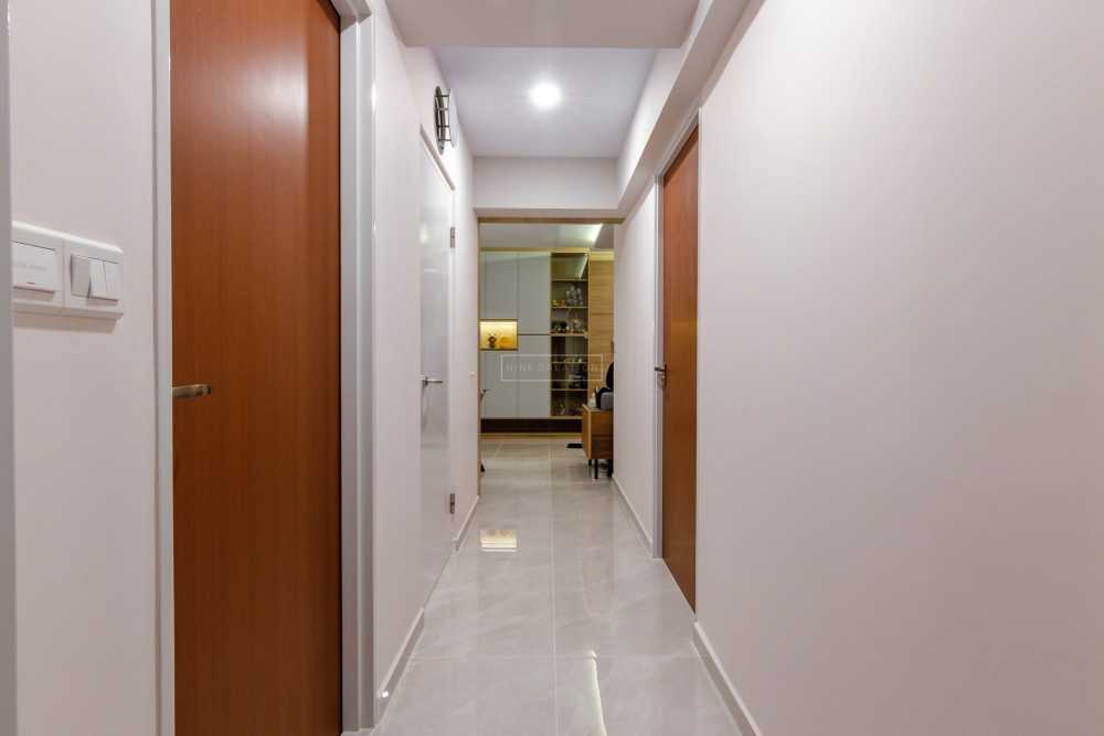 Scandinavian Hallway with Bookshelf and Artwork