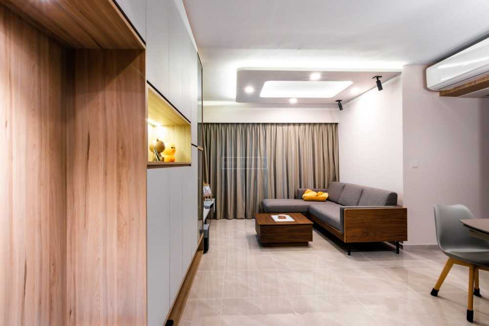 Scandinavian Living Room with Bookshelf and Homogeneous Tiles