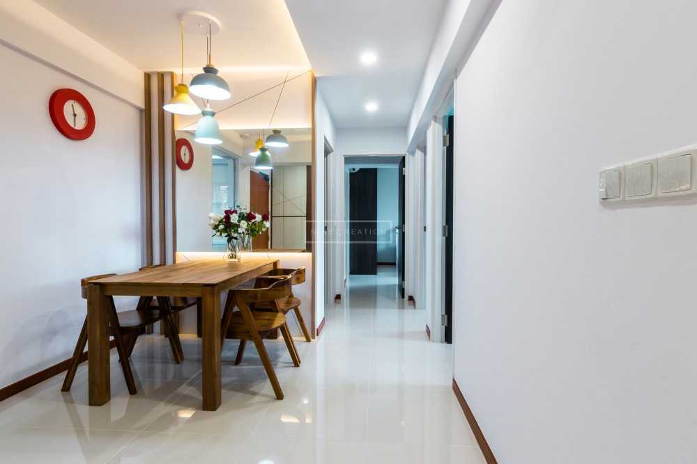 Scandinavian Dining Room with Mirror and Cove Lighting