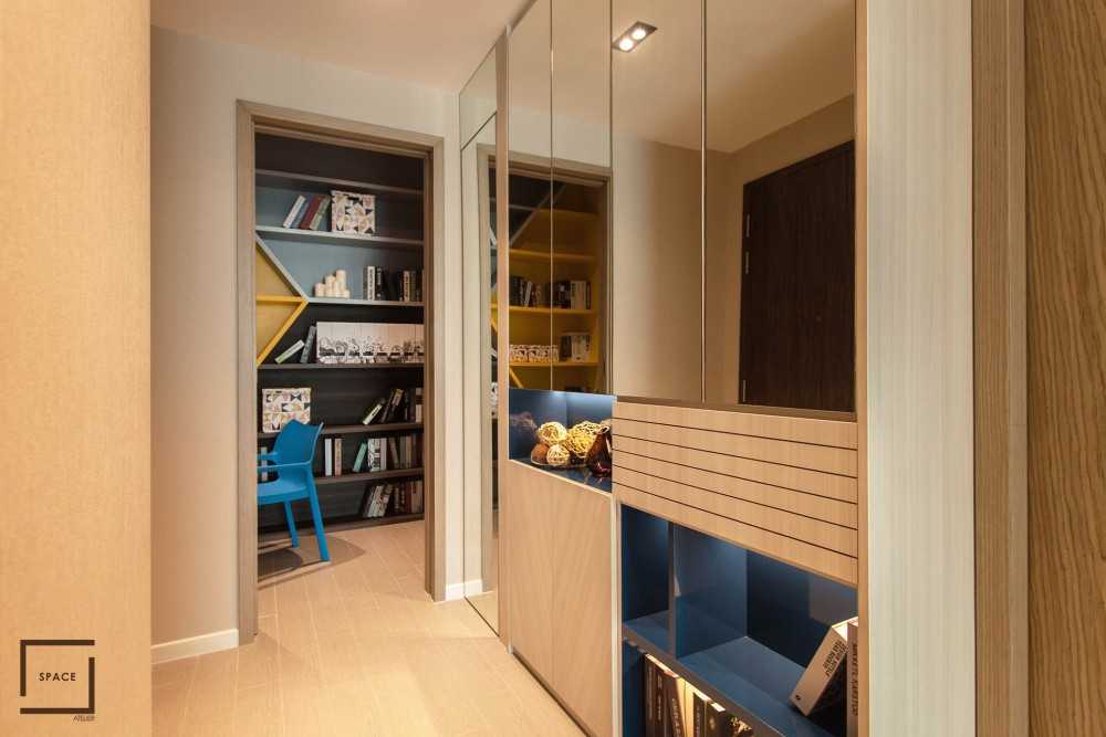 Contemporary Hallway with Bookshelf and Artwork