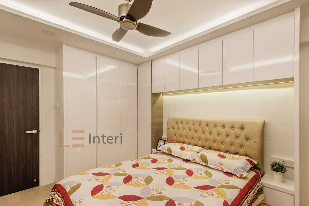 Contemporary Bedroom with Homogeneous Tiles and Cove Lighting