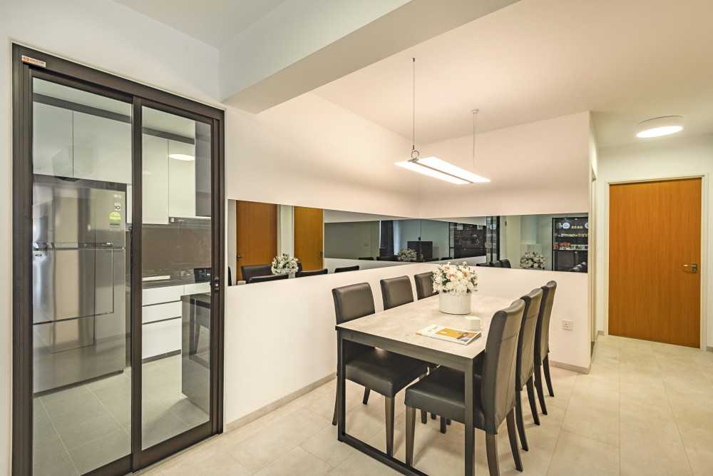 Contemporary Dining Room with Mirror and Glass Door