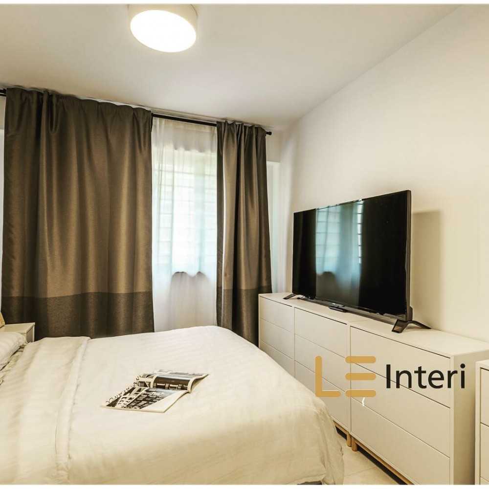 Contemporary Bedroom with Vinyl Flooring and TV Console