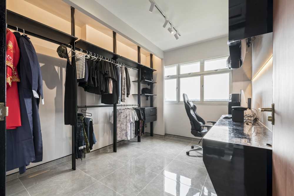 Modern Home Office with Bookshelf and Desk Chairs