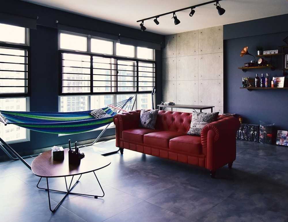 Transitional Living Room with Bookshelf and Homogeneous Tiles