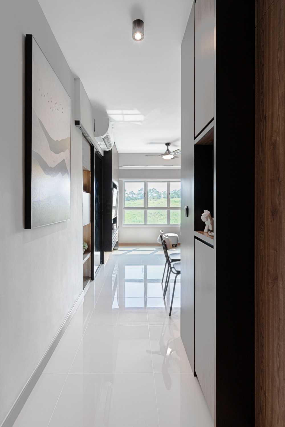 Modern Entryway with Paintings and Shoe Cabinets