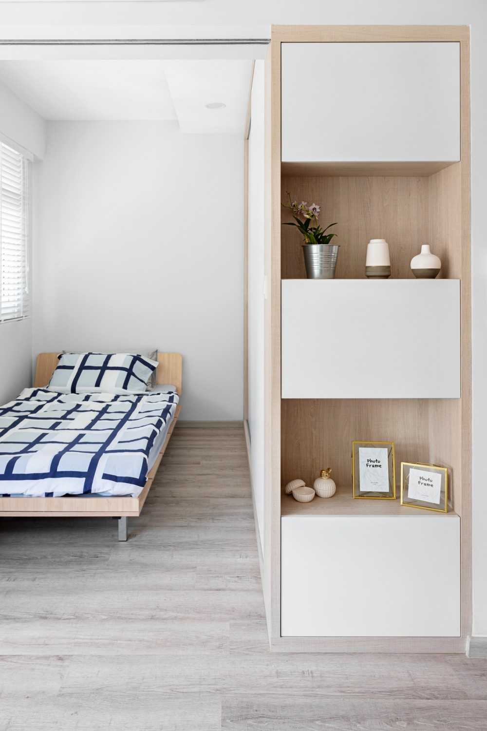 Scandinavian Bedroom with Open Storage and Bed