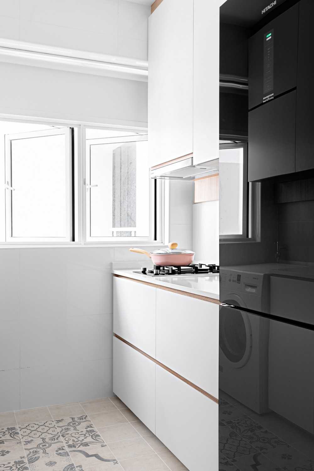 Scandinavian Kitchen with Kitchen Cabinets and Refrigerator