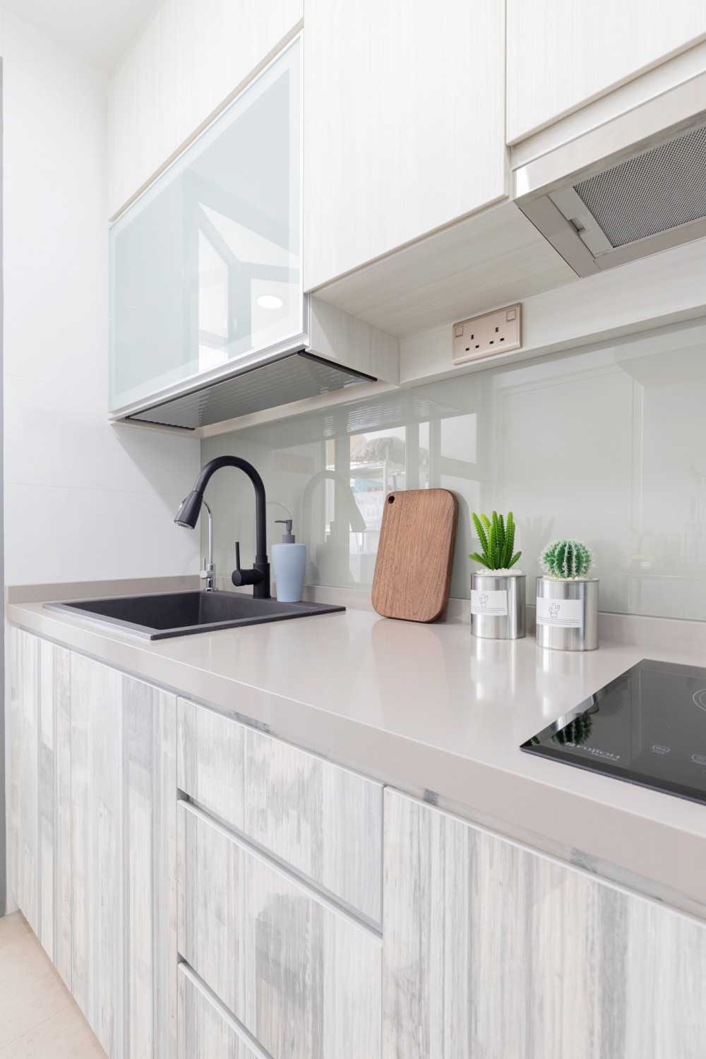 Minimalist Kitchen with Countertop and Kitchen Tap