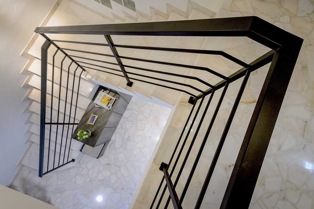 Contemporary Foyer with Marble Floor and Staircase