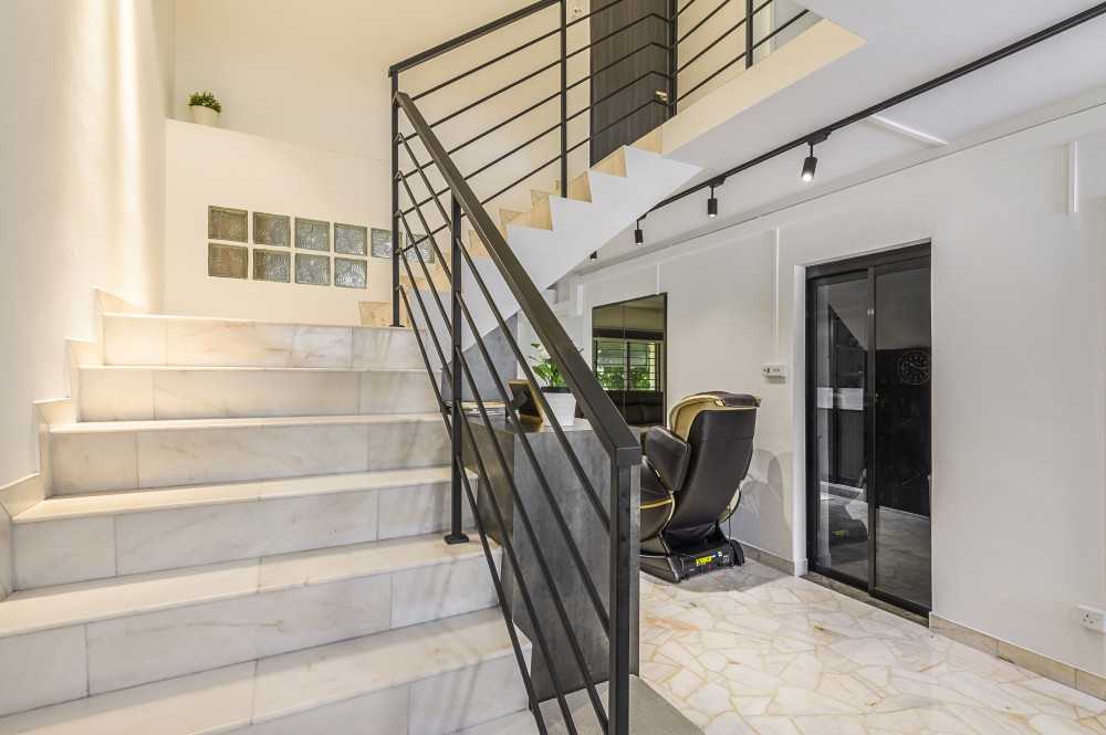 Contemporary Entryway with Marble Floor and Staircase