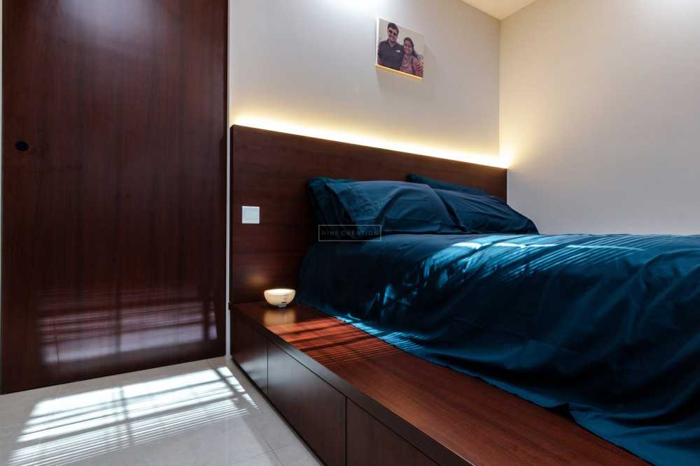 Asian Bedroom with Platform Bed and Homogeneous Tiles