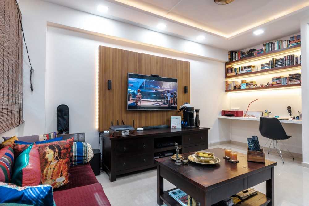 Asian Living Room with Feature Wall and Cove Lighting