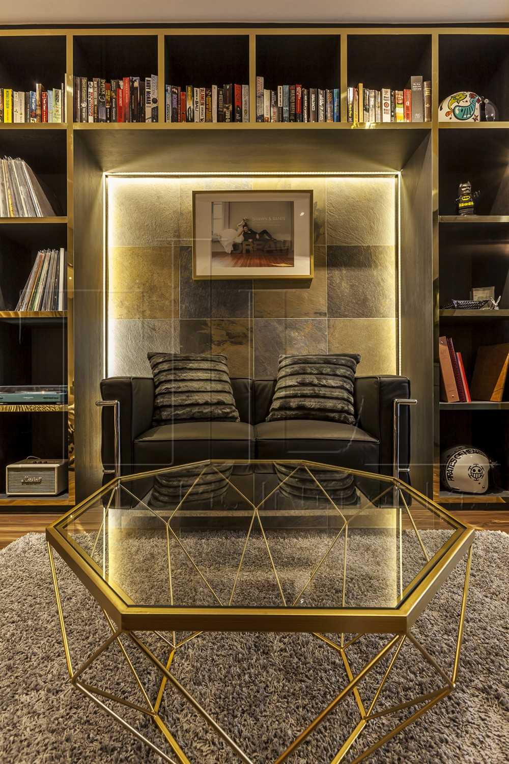 Modern Living Room with Bookshelf and Feature Wall