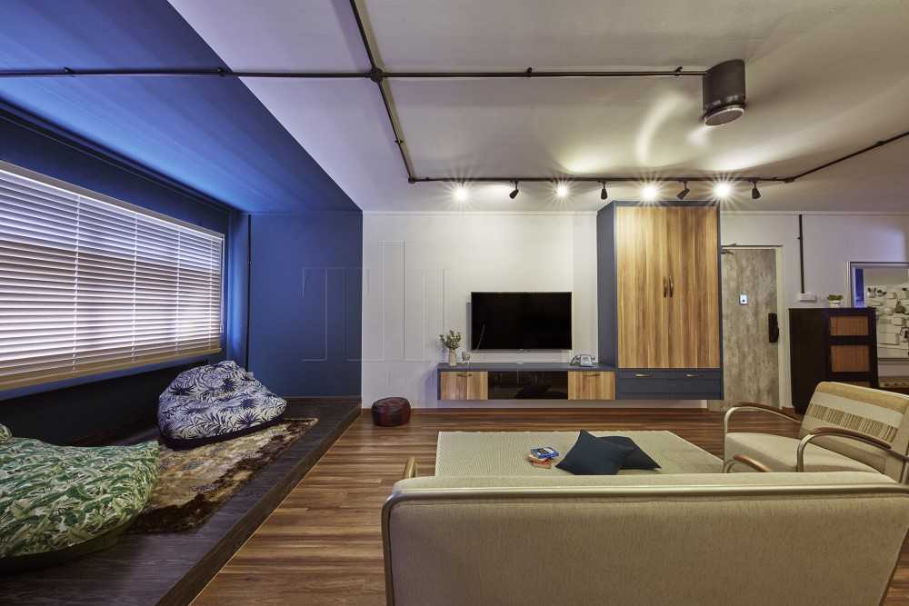 Eclectic Living Room with Wood Flooring and TV Console