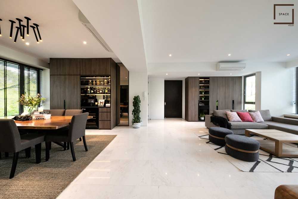 Contemporary Dining Room with Drop Light and Sofa