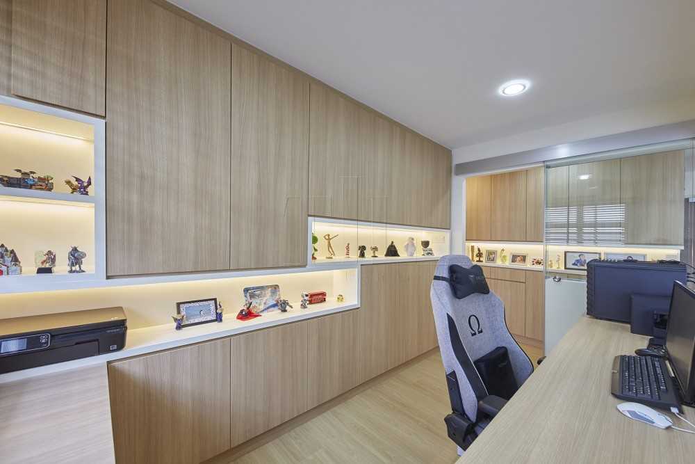 Minimalist Home Office with Wood Flooring and Feature Wall