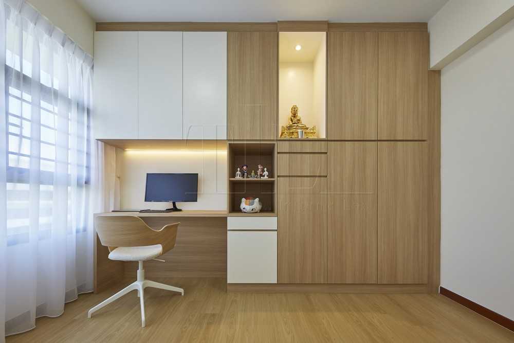 Minimalist Home Office with Bookshelf and Feature Wall
