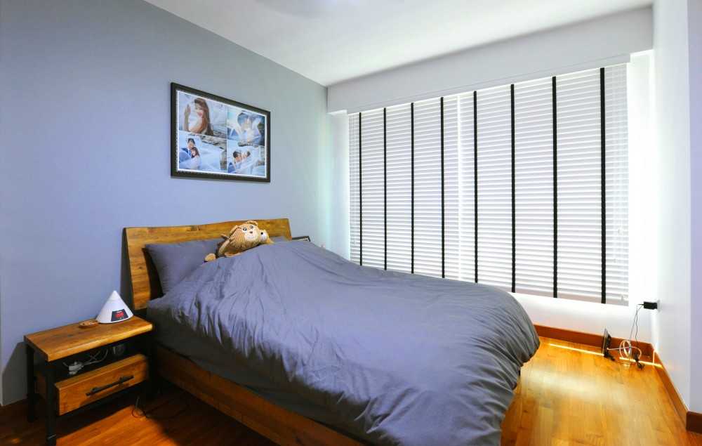 Industrial Bedroom with Parquet Floor and Bedside Table