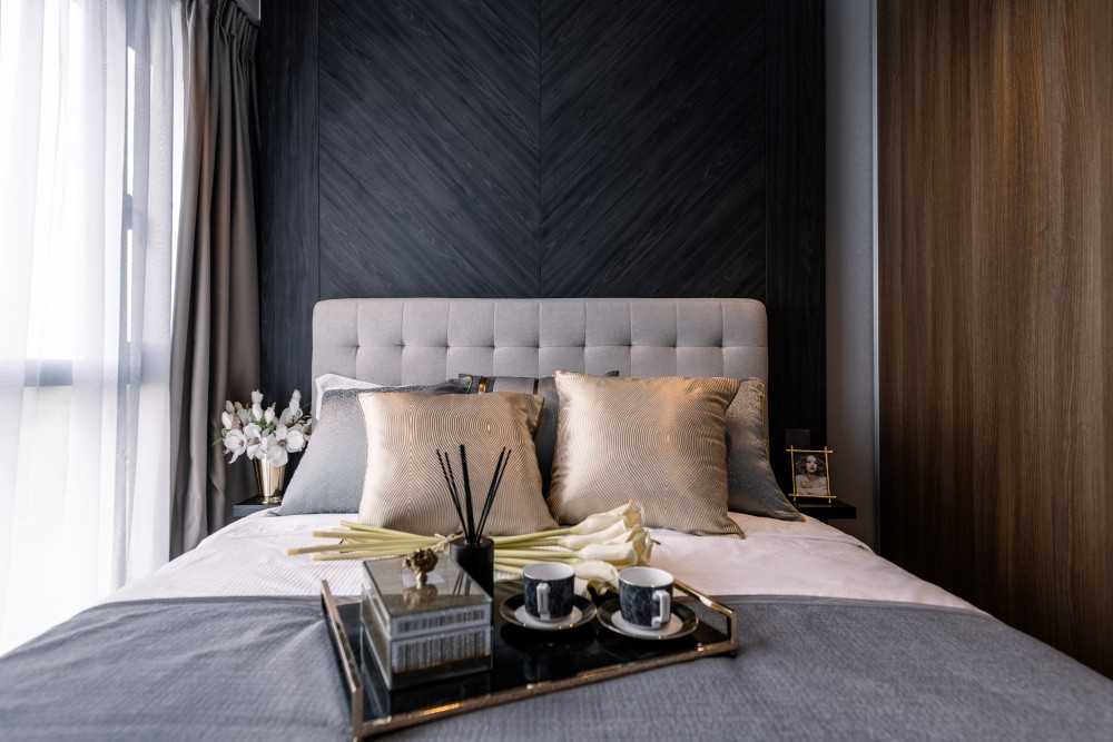 Contemporary Bedroom with Herringbone Tiling and Feature Wall