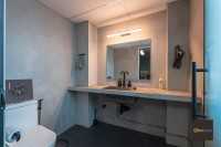 Industrial Bathroom at Midview City