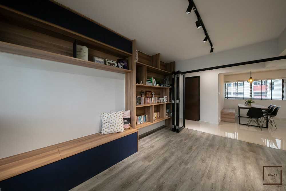 Industrial Living Room with Display Cabinets and Lighting
