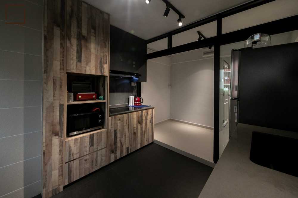 Industrial Kitchen with Oven and Refrigerator