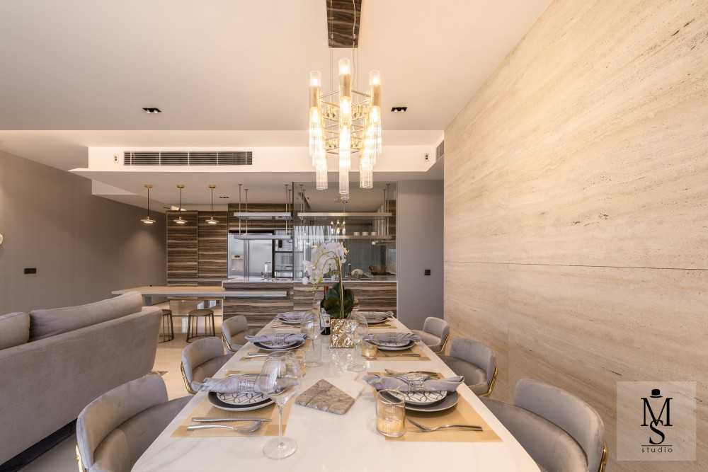 Modern Dining Room with Feature Wall and Chandelier