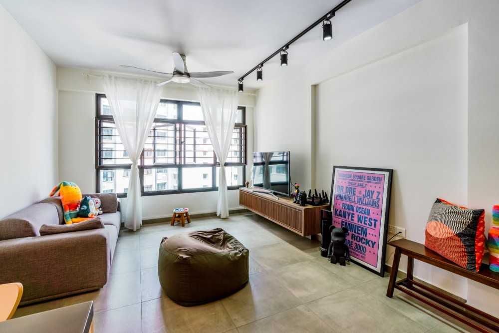 Modern Living Room with Homogeneous Tiles and TV Console