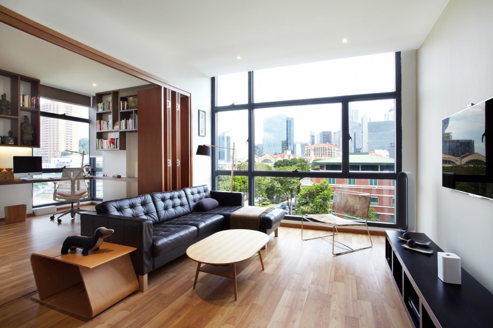 Contemporary Living Room with TV Console and Cove Lighting
