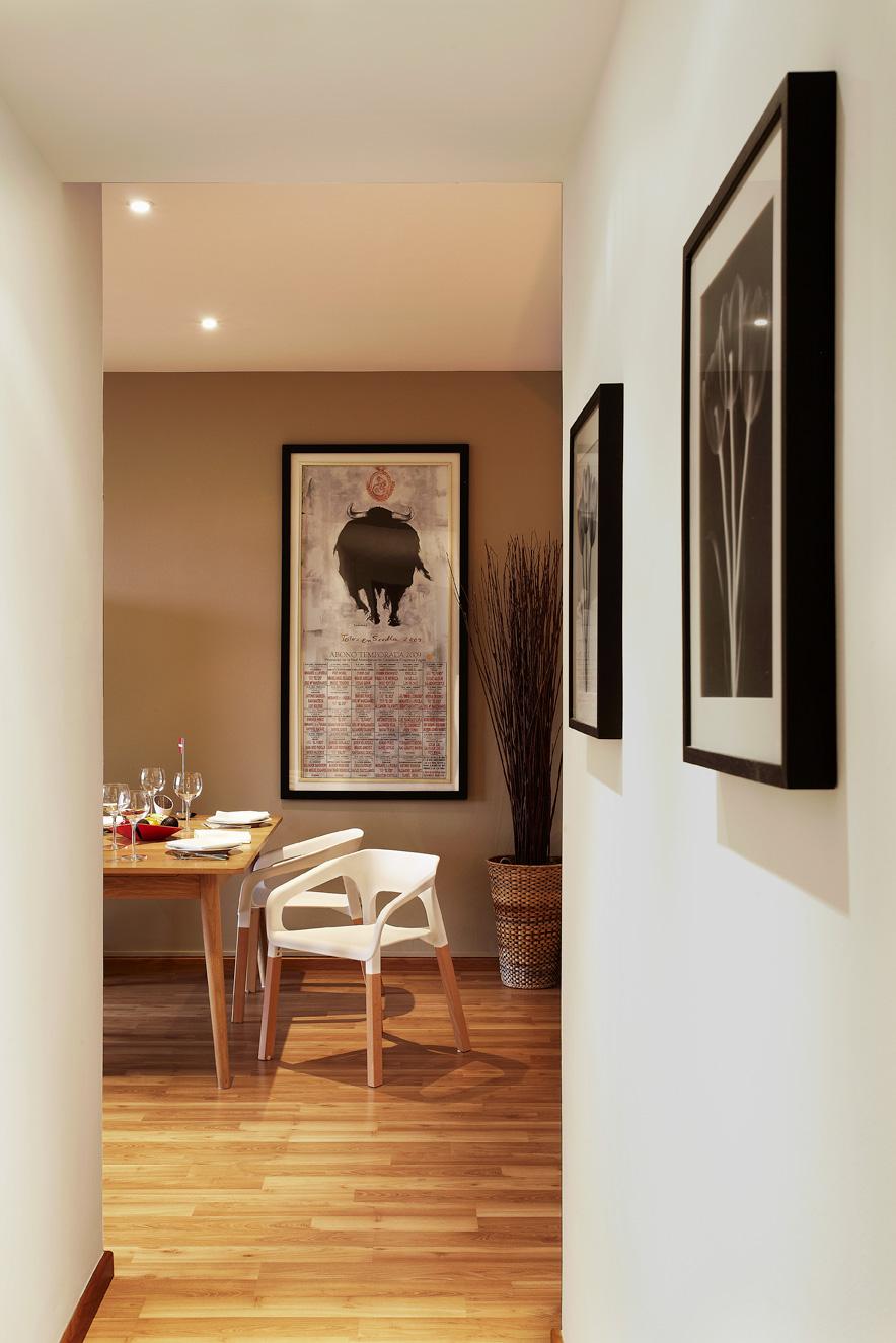 Contemporary Dining Room with Cove Lighting and Drop Ceiling