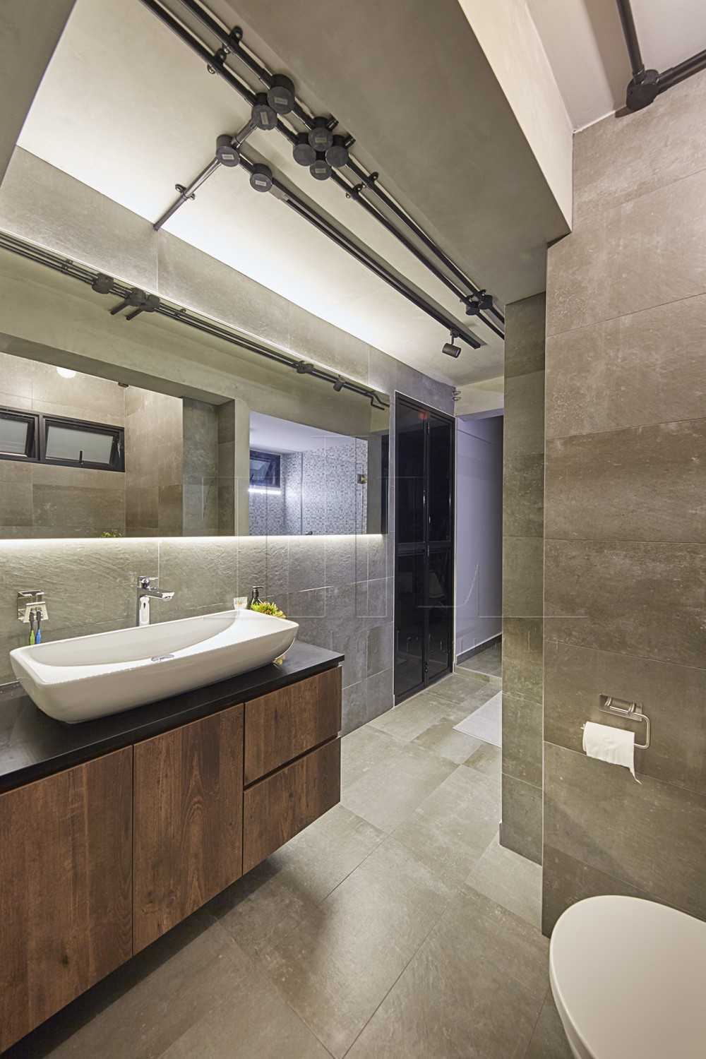 Industrial Bathroom with Mirror and Cove Lighting