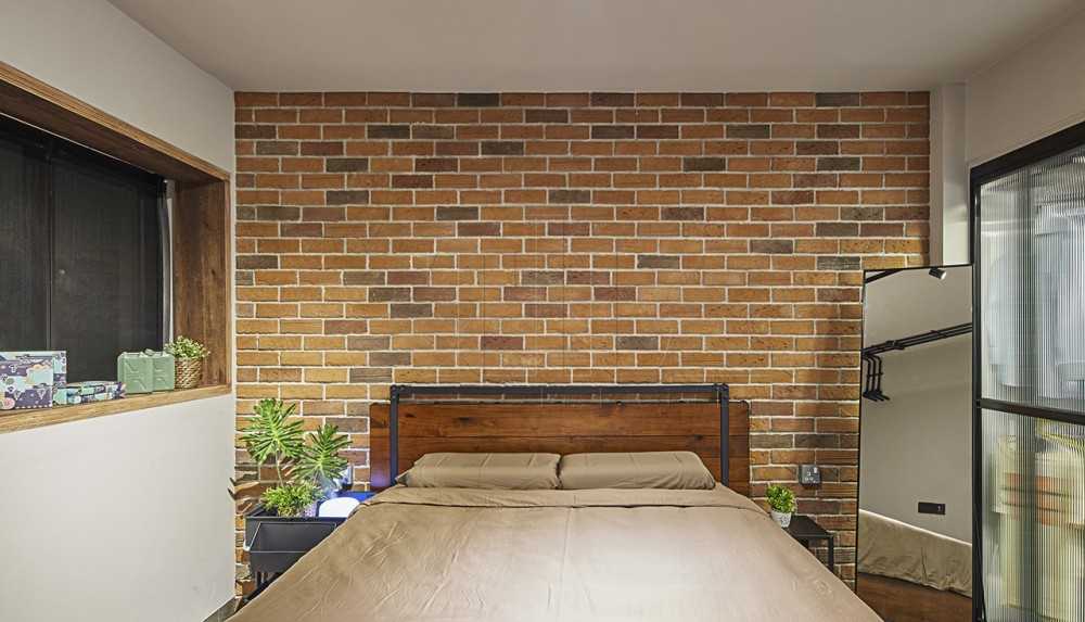 Industrial Bedroom with Feature Wall and Mirror