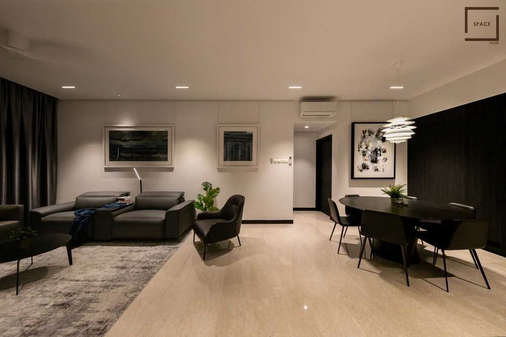 Minimalist Living Room with TV Console and Drop Light