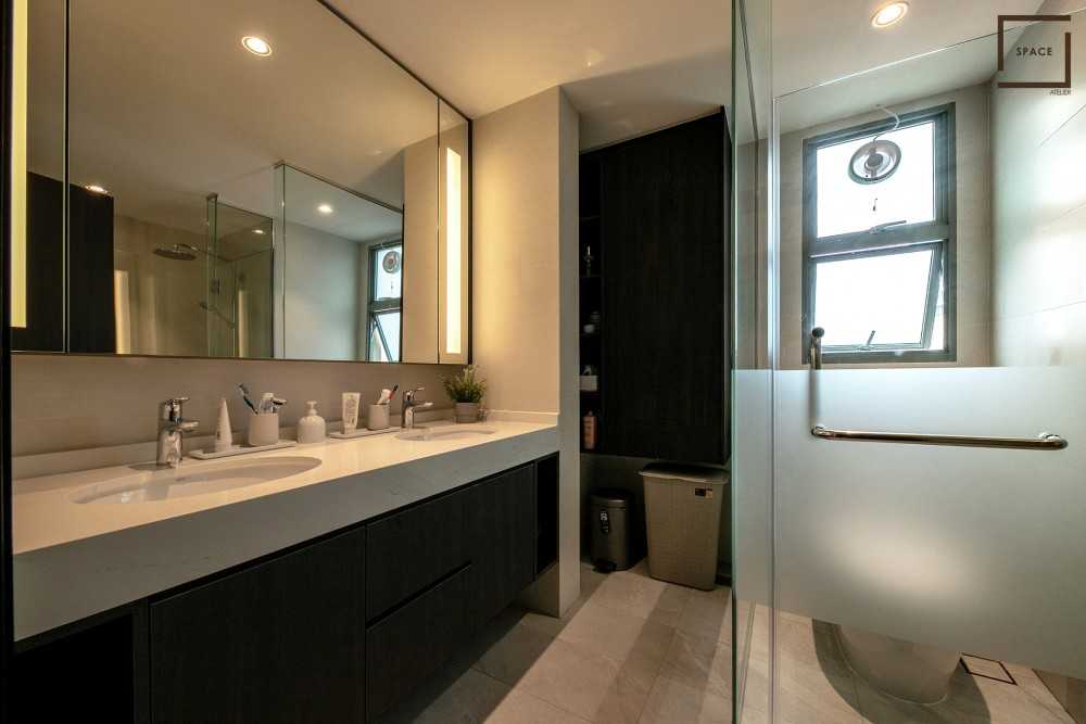 Minimalist Bathroom with Mirror and Laundry Baskets