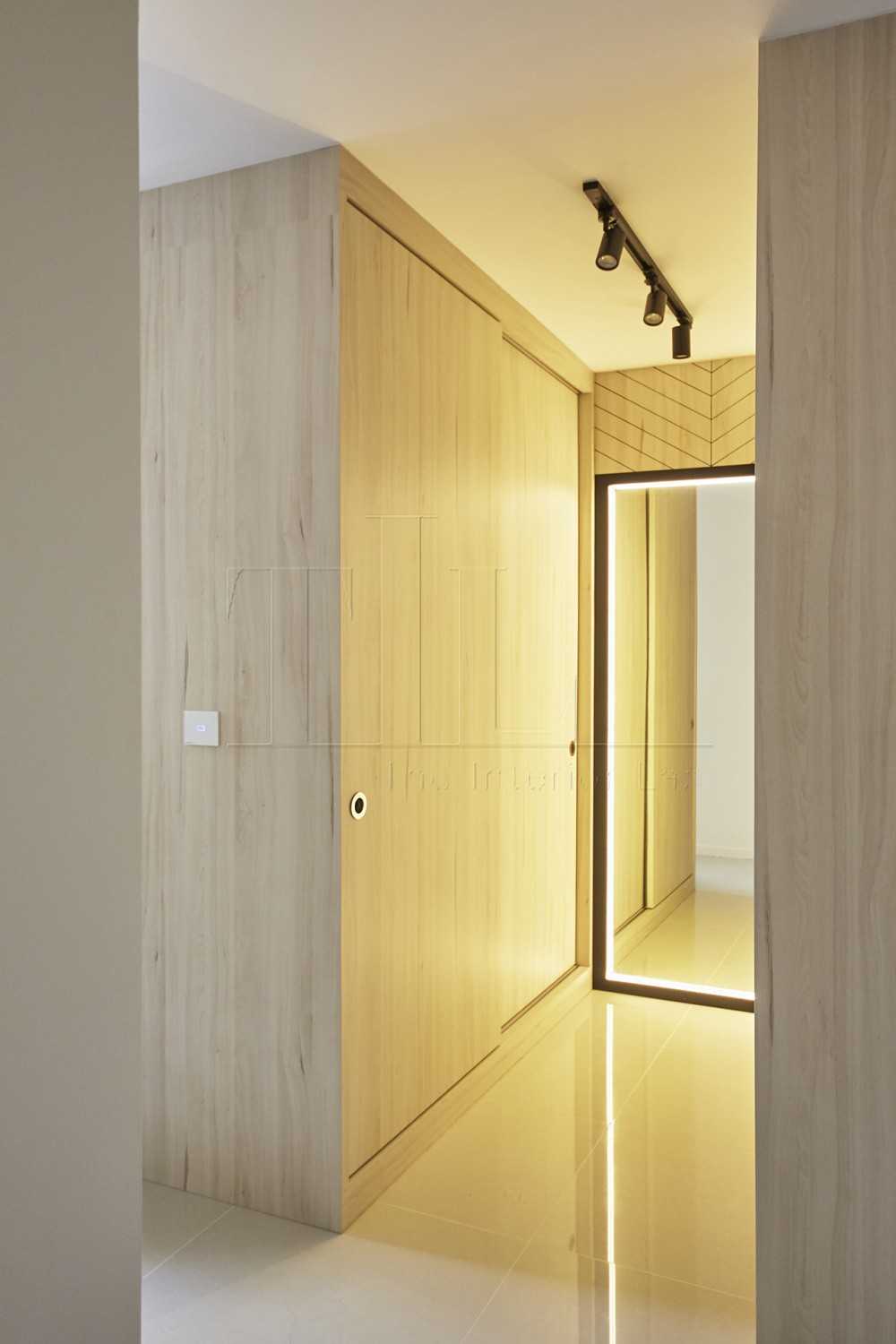 Minimalist Walk-in Wardrobe with Mirror and Cove Lighting