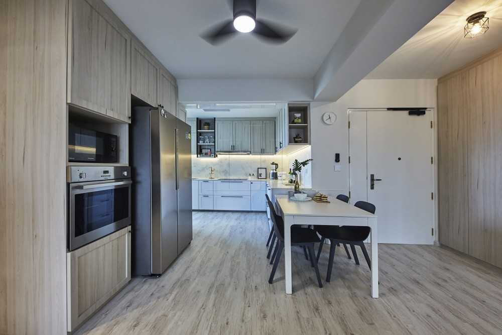 Minimalist Dining Room with Wood Flooring and Open Kitchen