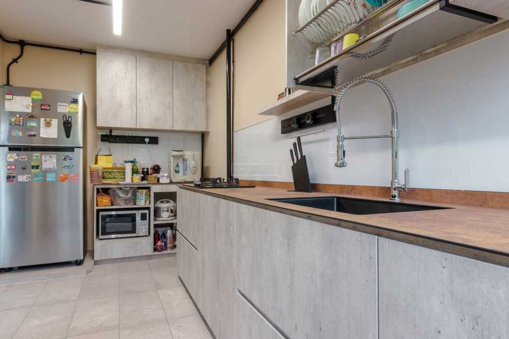 Industrial Kitchen with Countertop and Homogeneous Tiles